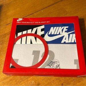 Nike Air Bodysuit and Blanket Set in Red, Blue, Black, and White